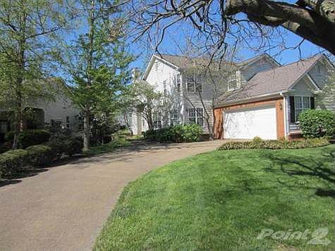 Home sits of street with 2 car garage and lots of off street parking.