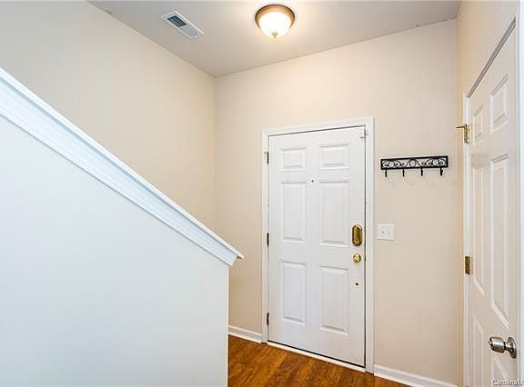 Front Entrance with stairs going upstairs.