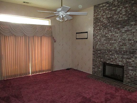 Living Room, Fireplace, and rear slider