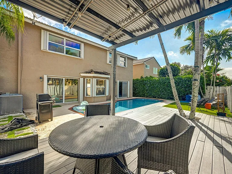 9581 NW 9th Ct — Photo 37