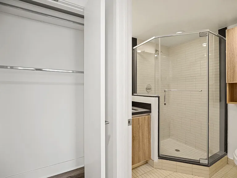Bathroom with Stand-Up Shower and Linen Closet