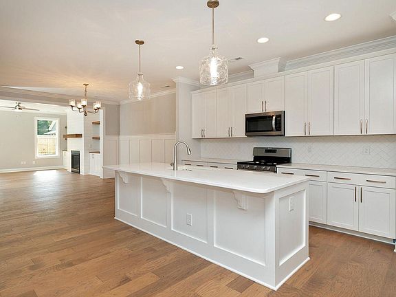 Kitchen, dining area, and living room
