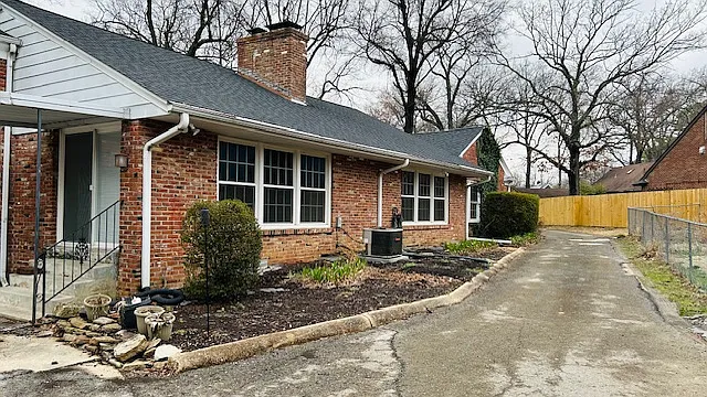 Wrap around driveway at the back of the home