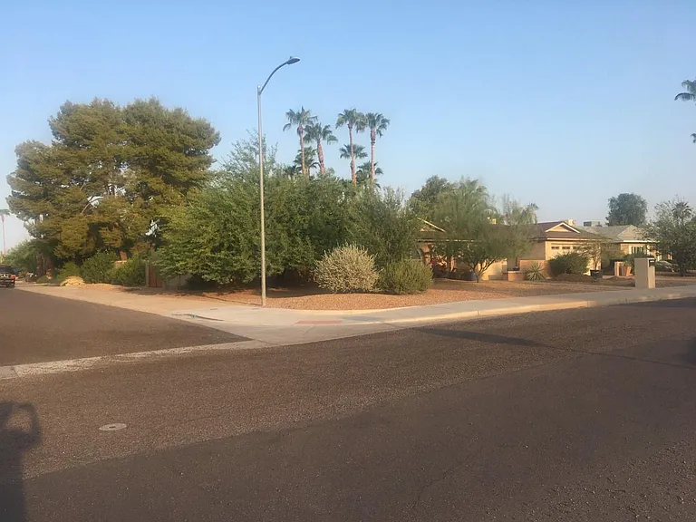 Large corner lot with mature landscaping