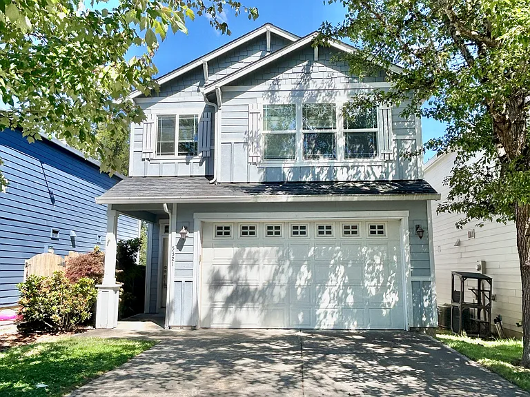Beautiful single family home with attached 2 car garage & driveway
