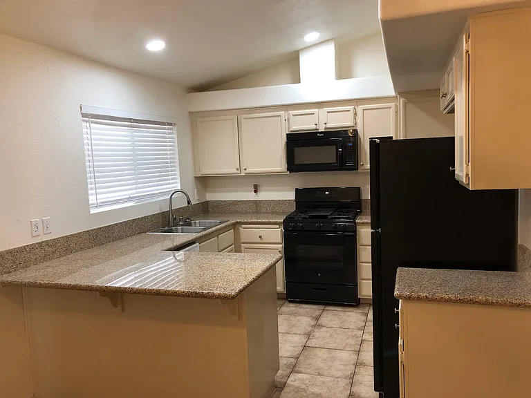 Kitchen with granite countertops