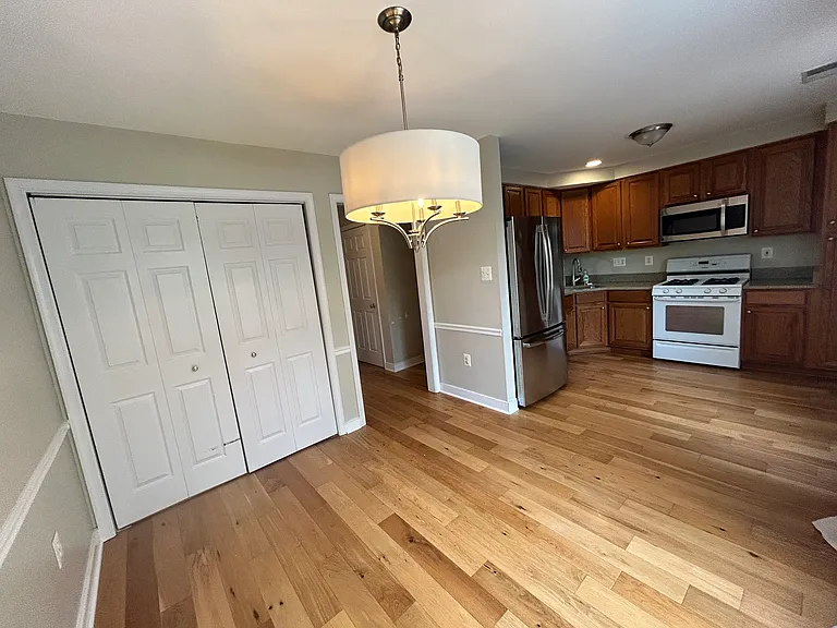 Hidden washer dryer off dining area