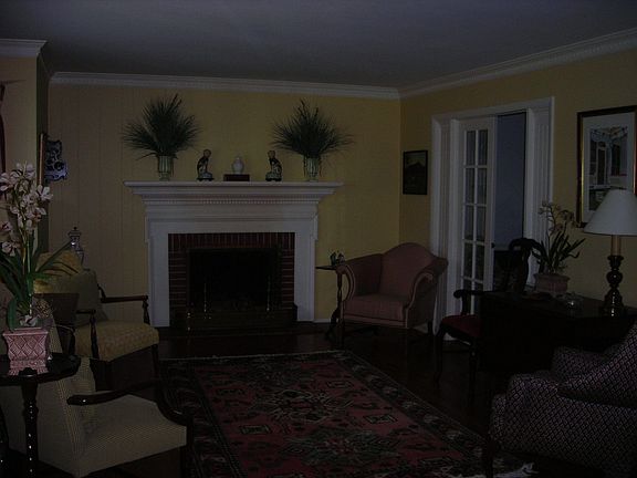 Living Room with Wood Burning Fireplace, Has Gas Logs