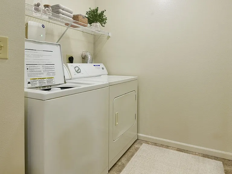 The in-unit washer and dryer at Heatherwood Apartments, Grand Blanc, Michigan