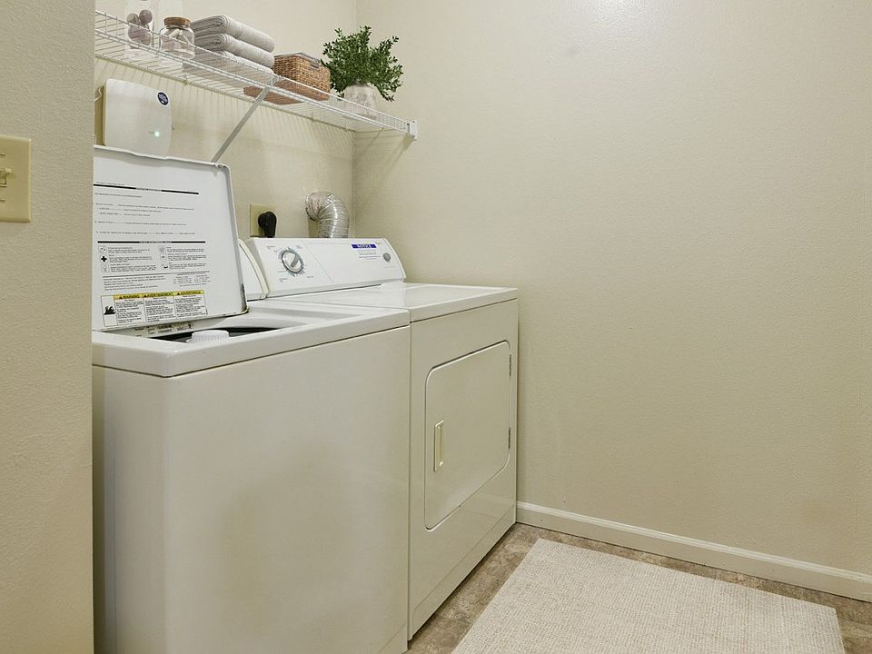 The in-unit washer and dryer at Heatherwood Apartments, Grand Blanc, Michigan