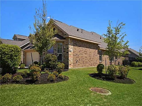 The corner lot allows for extra yard space for the kids to play!