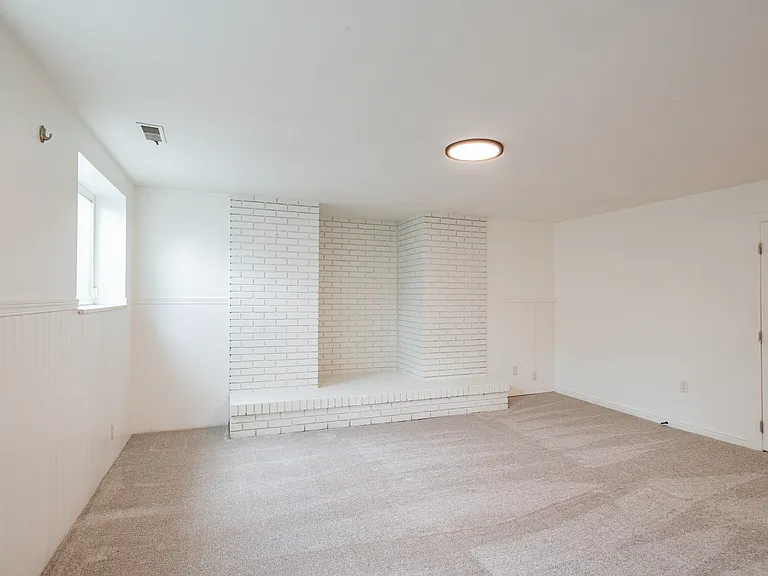 Large living room with new carpet