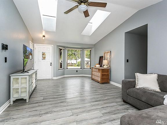 LARGE Living space with a cool bay window. 