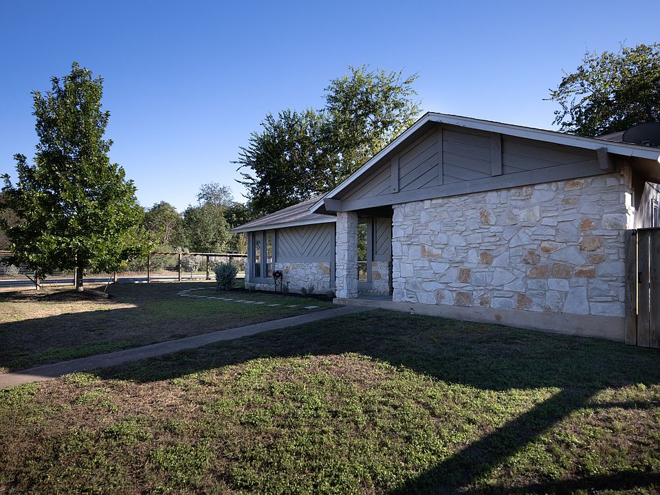 Completely fenced in large corner lot.