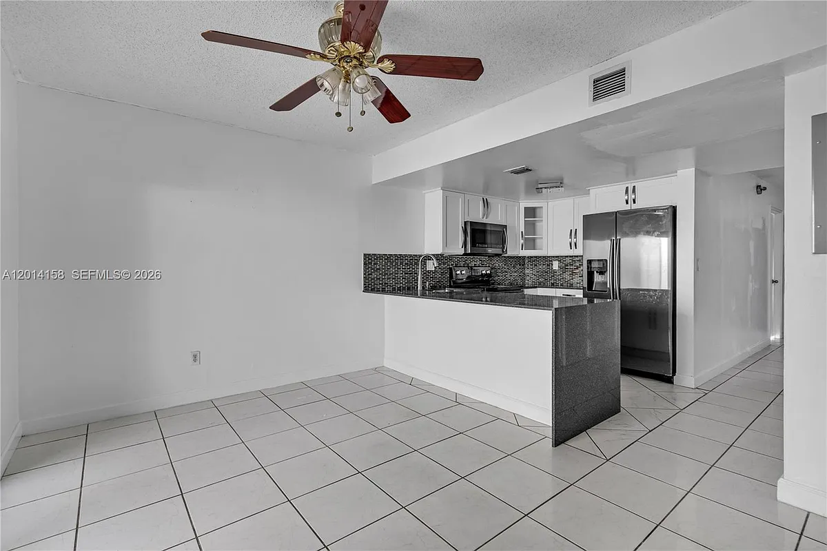 Building Photo - 5375 W 23rd Ct #14-10