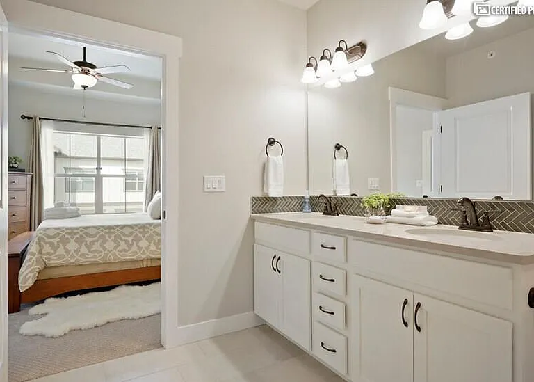 High end quartz and modern tiled floor and backsplash