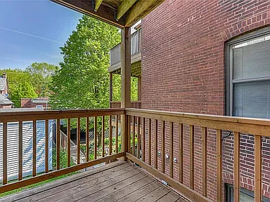 Private deck off primary bedroom sunroom