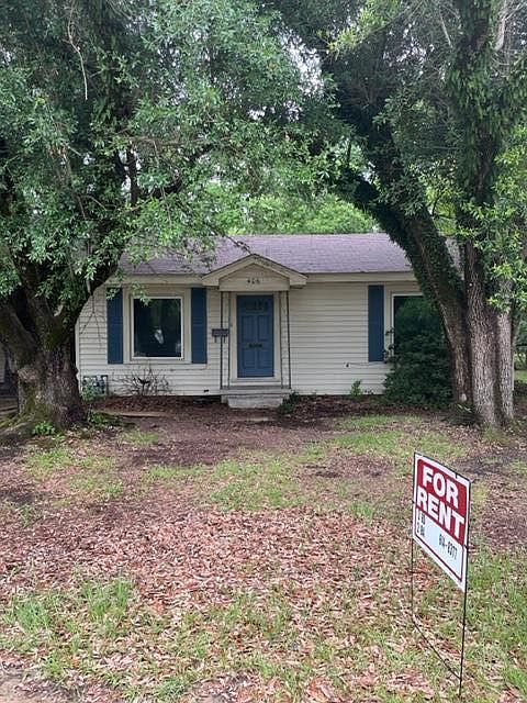 Located in quiet and shady neighborhood, this bungalow has an attached 2 car carport