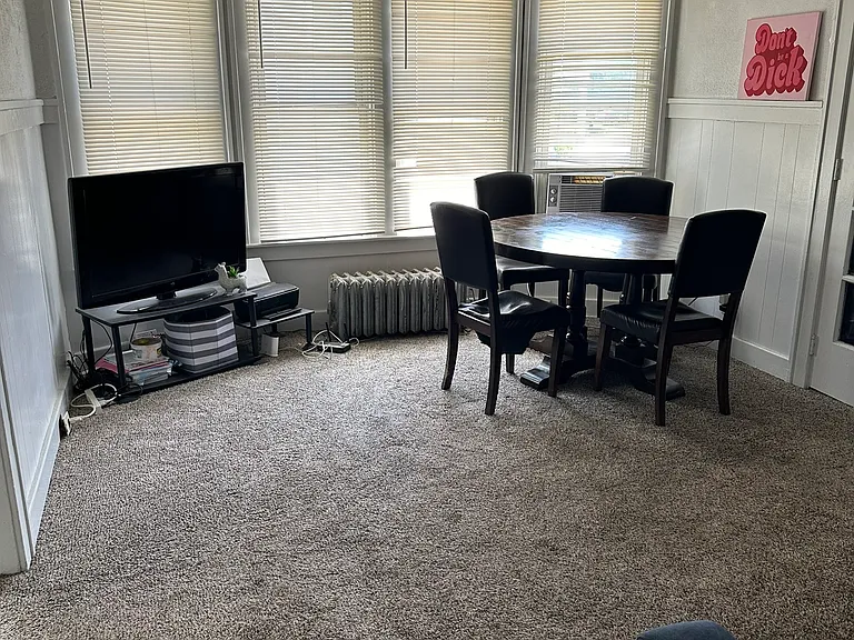 Living room with bay windows and lots of light