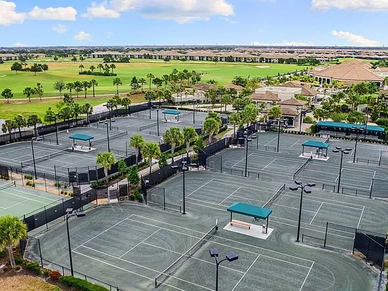 Eight lighted Har-Tru tennis courts and automatic ball retrieval court.