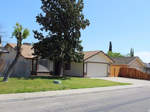 Clear blue skies accent the contemporary feel of this nice home.