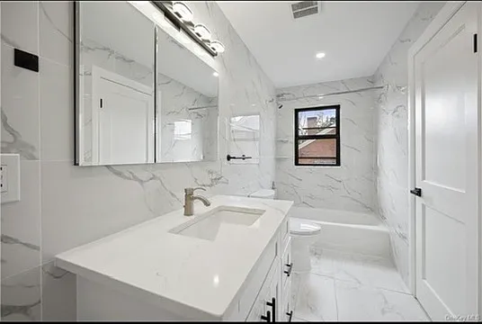 504 Ashford Ave #1W — Photo 8