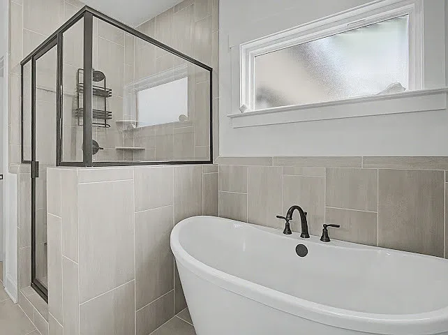 Primary Bathroom With Soaker Tub And Shower