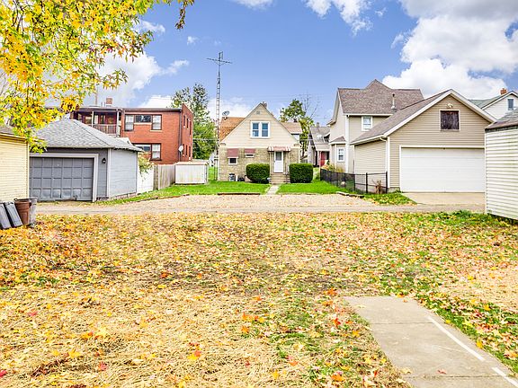 Flat yard with alley behind 