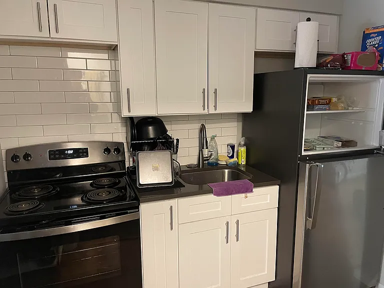 Kitchen. SS Fridge and Stove