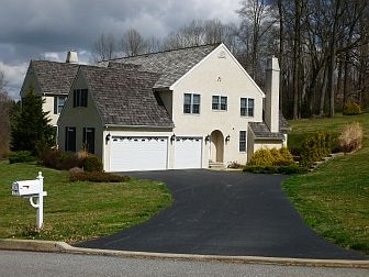 Turned 3 Car Garage & Side Entrance