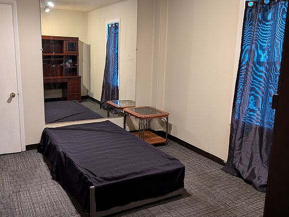 Bedroom 2- with furnishing -desk with shelves and drawers, nightstand, cot minus mattress - optional can be removed.