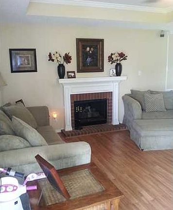 Living room with hardwood type flooring