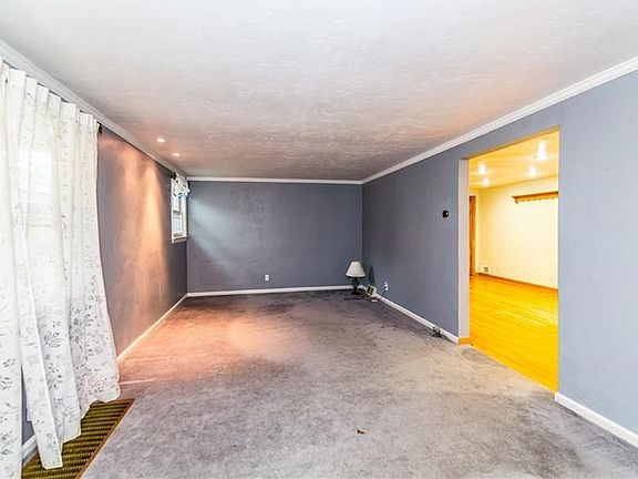 The Living Room is only one of the many gaterhing places you'll find in this lovely home.