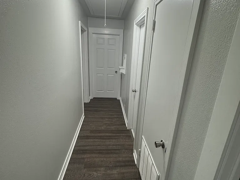 Hallway to bedroom and bathroom