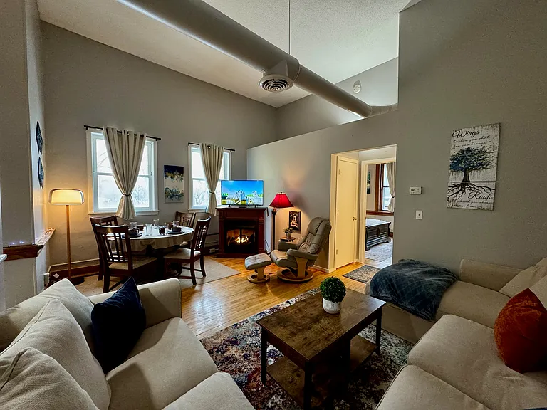 Queen sleep sofa for guests, heat & massage chair and cozy fireplace to enjoy your favorite shows.