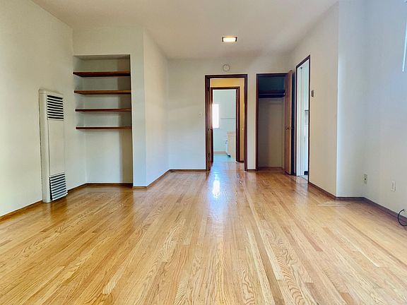 Living room and dining room. (Kitchen is to the right)