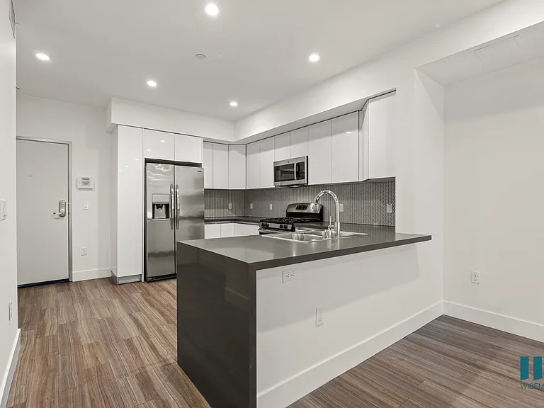 Open-Concept with Energy-Efficient Appliances and Countertop Bar