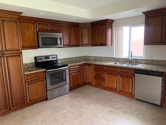 Kitchen with Microwave and dishwasher.