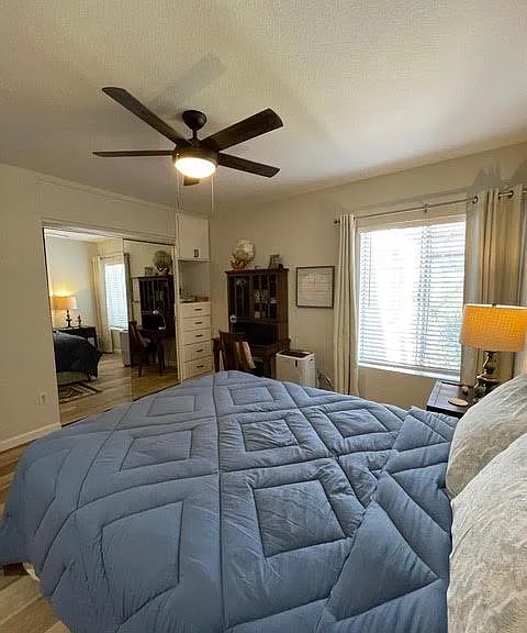 Master BR, large closet, built in drawers and dresser. Queen bed, and desk.