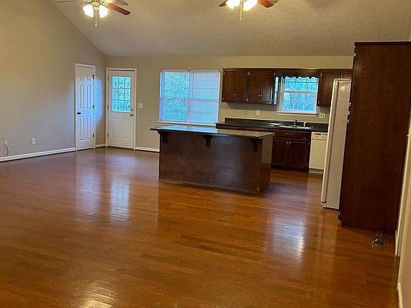 A view of the kitchen and dining area from the living room.