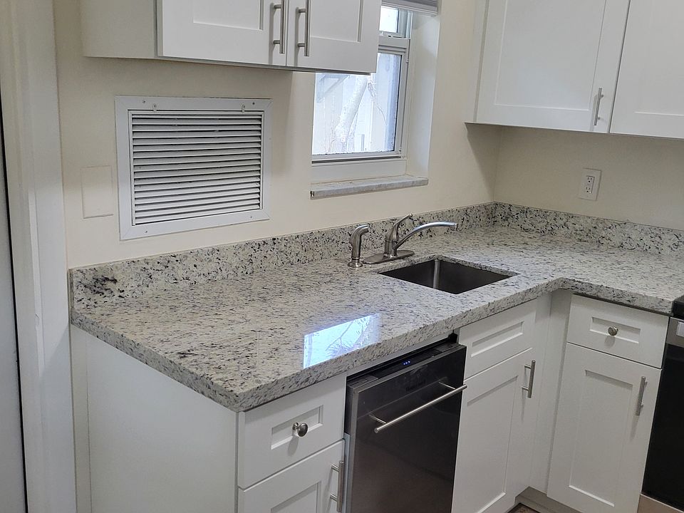 new granite counter tops and new stainless steel dishwasher. Deep undermount sink