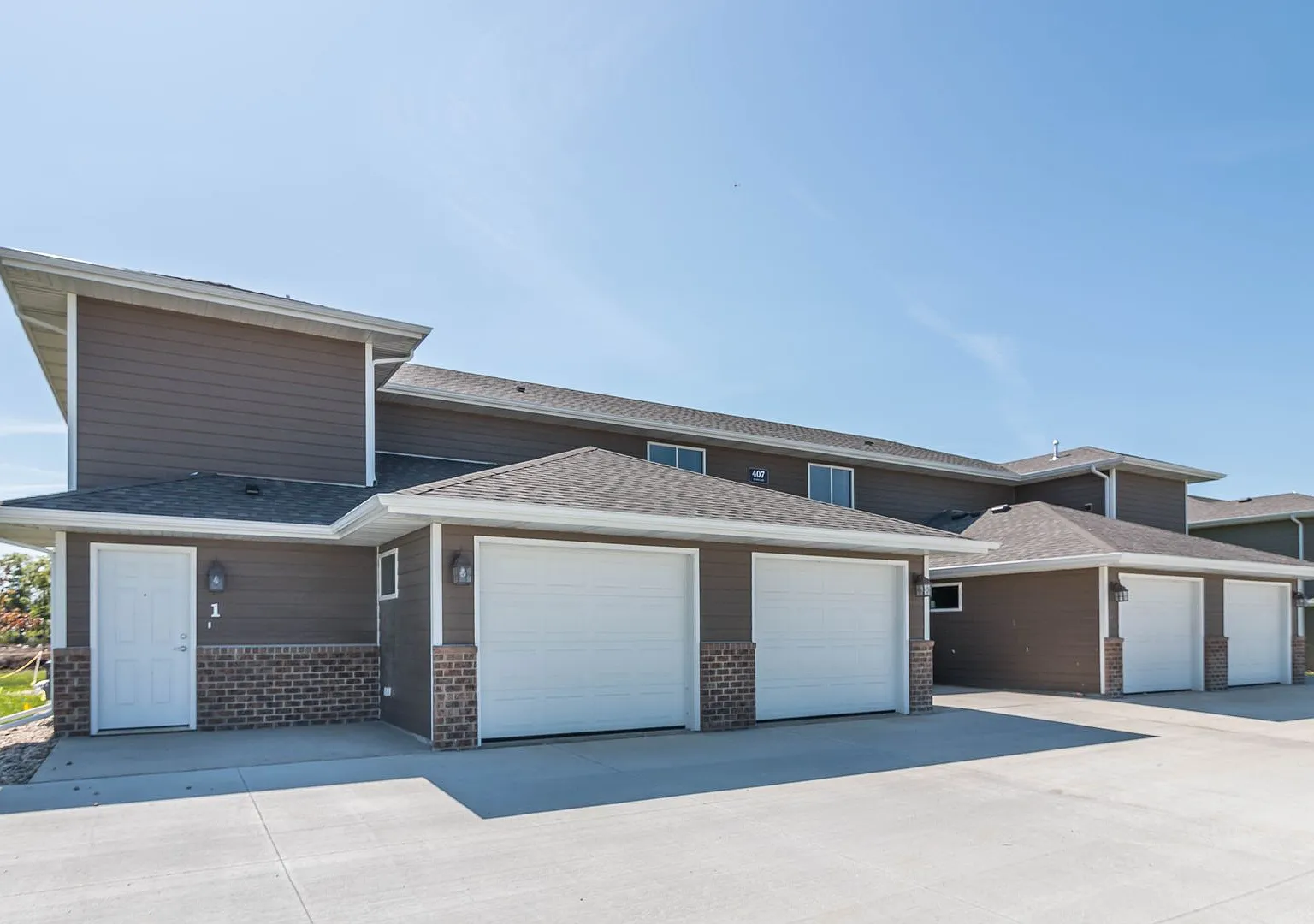 3 Bedroom Barker Place Townhome with Attached Garage & In-Unit Laundry — Photo 2