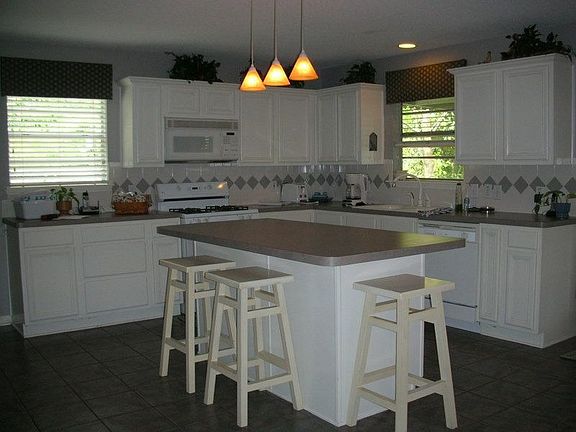 The kitchen is open to the dining and family room