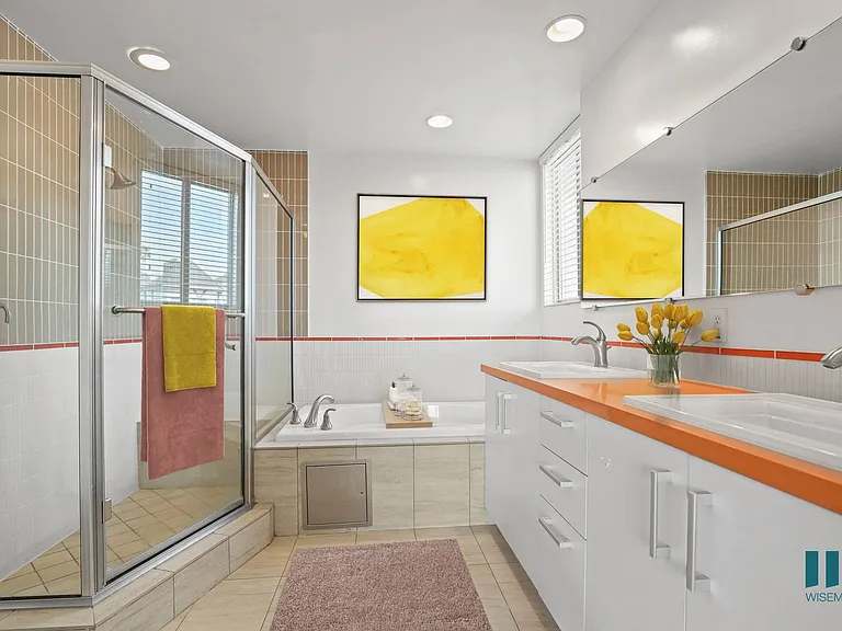 Bathroom with Walk-In Shower, Bathtub, and Double-Sink Vanity with Cabinet Storage