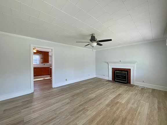 Living Room with new fan and new luxury vinyl flooring