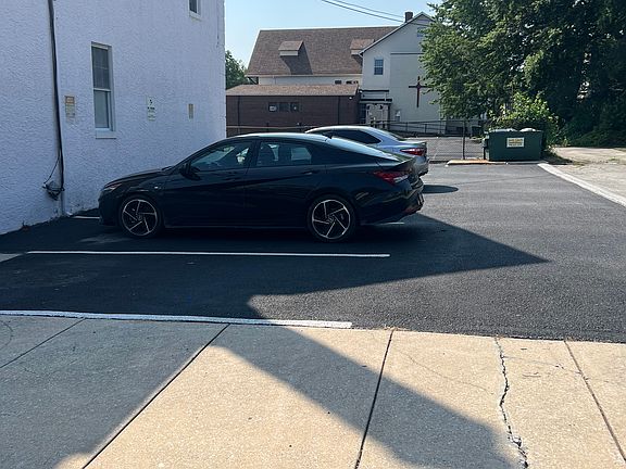 Rear parking lot for Tenants.