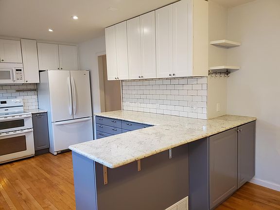 Nook for coffee bar and space for counter stools.