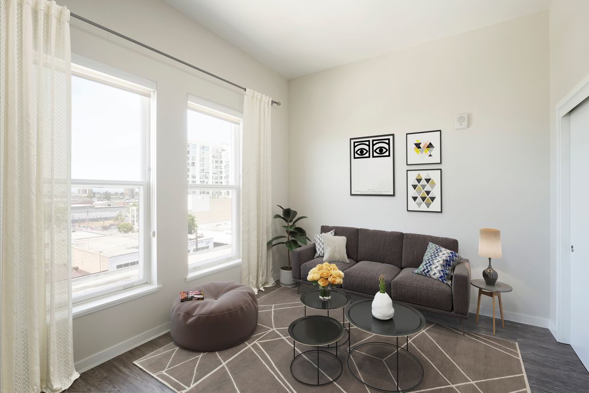 Tall ceilings, gorgeous light filled studio that can easily go from an entertaining space to bedroom.