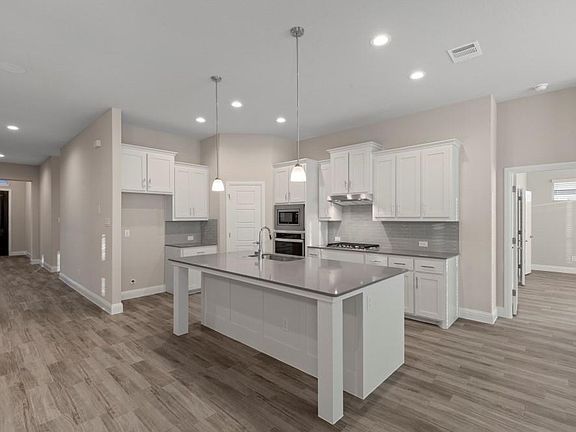 Photos shown here may not depict the specified home & features included are for illustration purposes only.