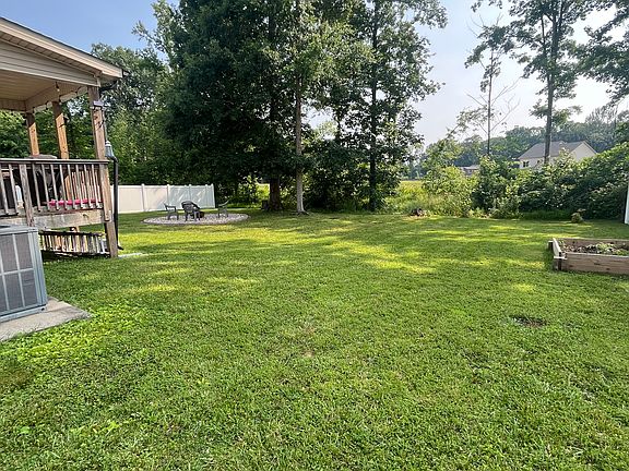 Back yard. (small raised garden & fire pit)
